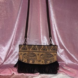Cross body, cork purse with fringe. Hindi